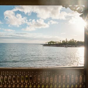 Late afternoon sun shines on Kailua Bay, as seen from the upper lanai.