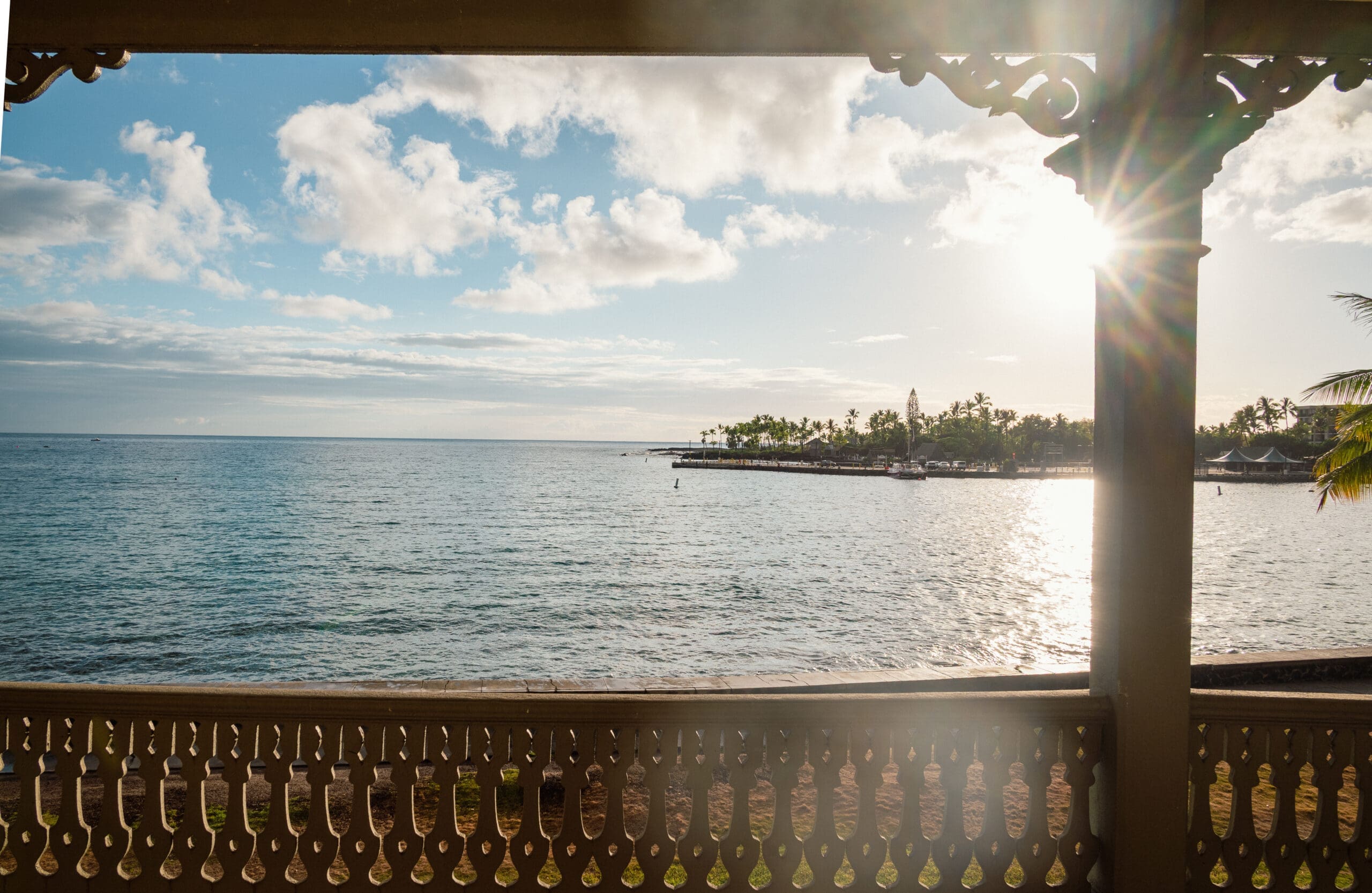Late afternoon sun shines on Kailua Bay, as seen from the upper lanai.